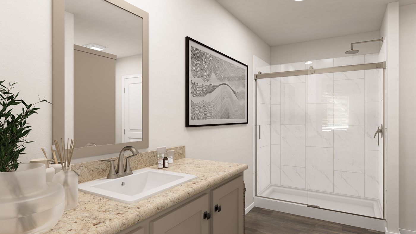 The DRM682F 68' DREAM Primary Bathroom. This Manufactured Mobile Home features 4 bedrooms and 2 baths.