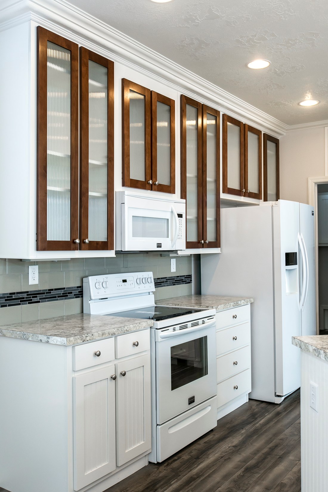 The ING681F EUCALYPTUS   (FULL) GW Kitchen. This Manufactured Mobile Home features 3 bedrooms and 2 baths.