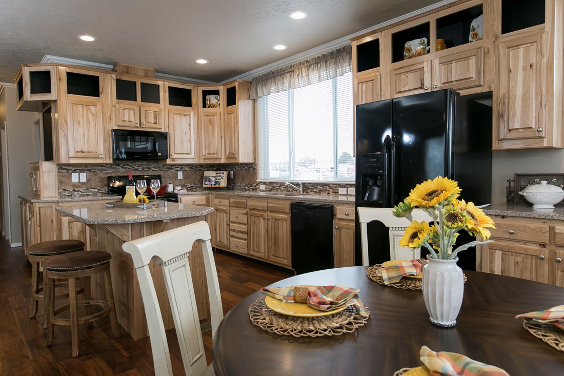 The THE SPRUCE Kitchen. This Manufactured Mobile Home features 3 bedrooms and 2 baths.