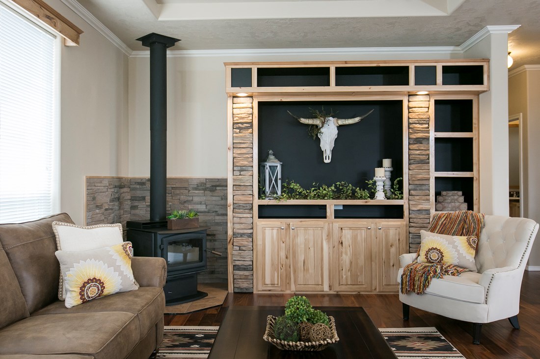 The THE SPRUCE Living Room. This Manufactured Mobile Home features 3 bedrooms and 2 baths.