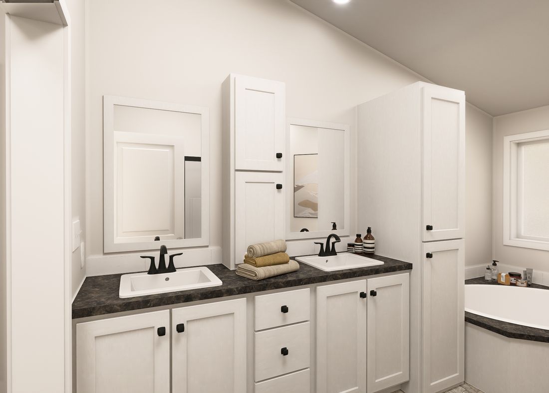 The ING601K WHITE PINE          GW Primary Bathroom. This Manufactured Mobile Home features 3 bedrooms and 3 baths.