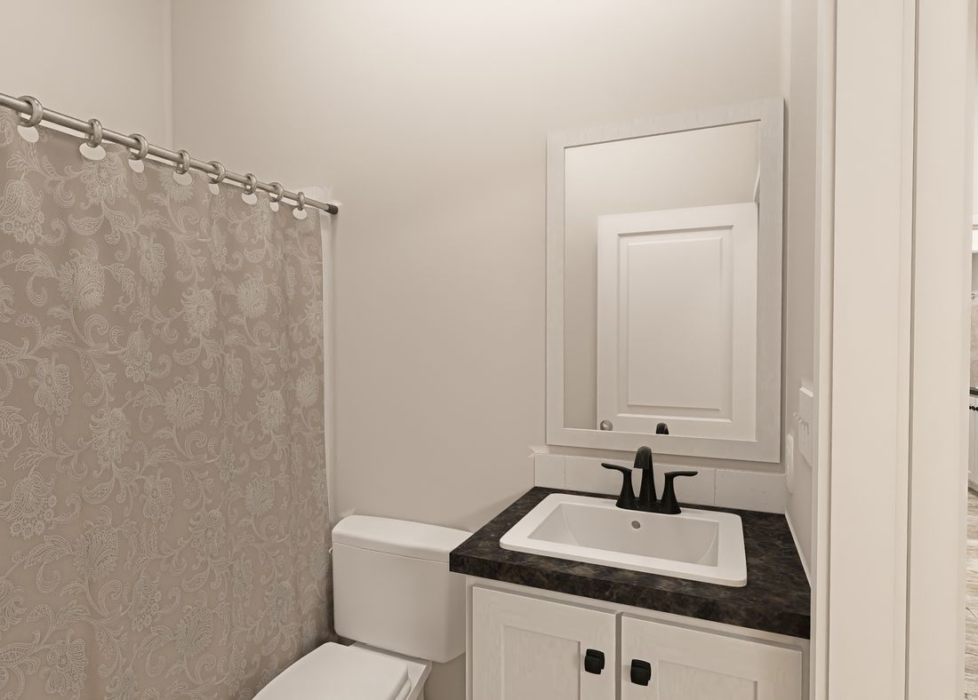 The ING601K WHITE PINE          GW Guest Bathroom. This Manufactured Mobile Home features 3 bedrooms and 3 baths.