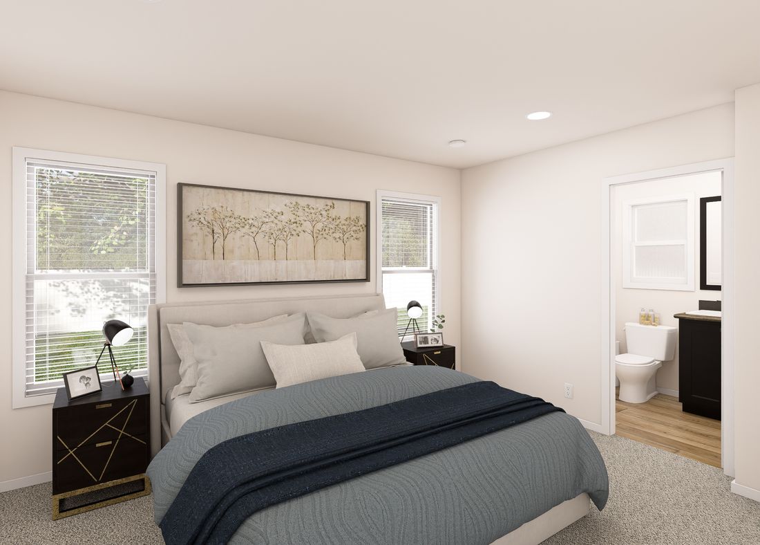 The DRM402P 2040'            DREAM Primary Bedroom. This Manufactured Mobile Home features 2 bedrooms and 2 baths.