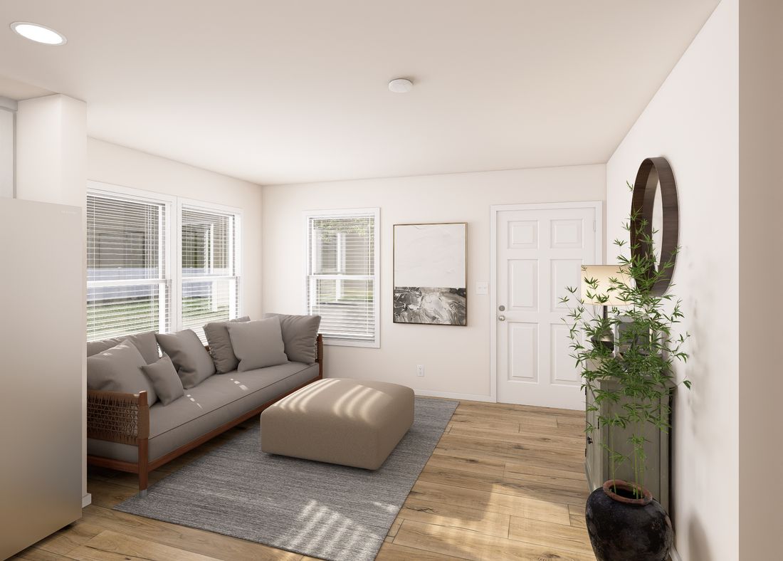 The DRM402P 2040'            DREAM Living Room. This Manufactured Mobile Home features 2 bedrooms and 2 baths.