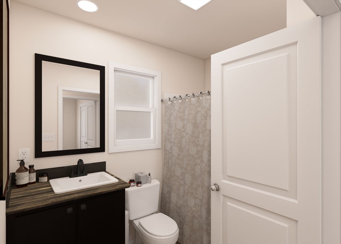 The DRM402P 2040'            DREAM Guest Bathroom. This Manufactured Mobile Home features 2 bedrooms and 2 baths.