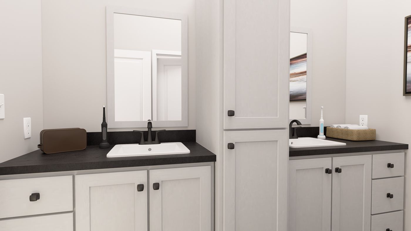 The ING602K GENERAL SHERMAN GW Guest Bathroom. This Manufactured Mobile Home features 3 bedrooms and 2 baths.
