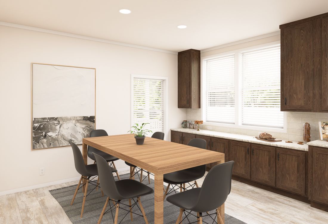 The ING763G PALM Dining Area. This Manufactured Mobile Home features 3 bedrooms and 2 baths.
