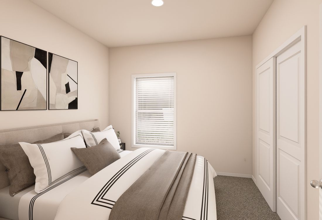 The ING763G PALM Bedroom. This Manufactured Mobile Home features 3 bedrooms and 2 baths.