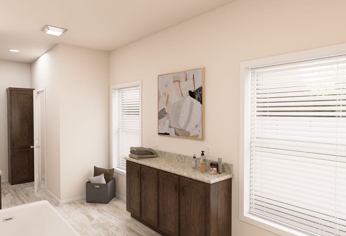 The ING763G PALM Primary Bathroom. This Manufactured Mobile Home features 3 bedrooms and 2 baths.