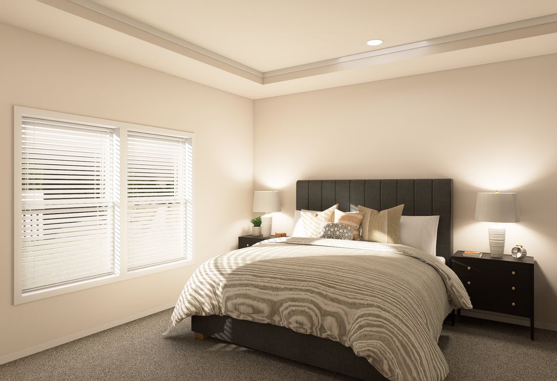 The ING763G PALM Primary Bedroom. This Manufactured Mobile Home features 3 bedrooms and 2 baths.