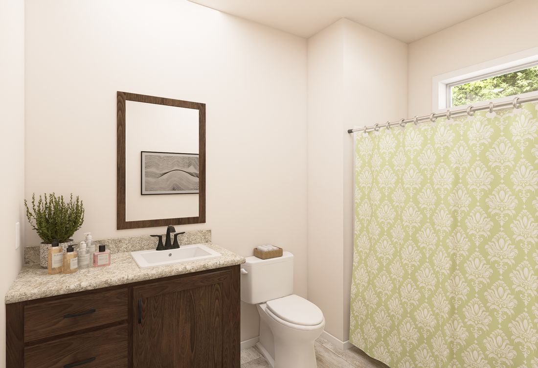 The ING763G PALM Guest Bathroom. This Manufactured Mobile Home features 3 bedrooms and 2 baths.
