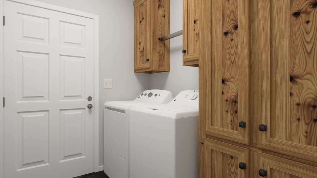 The ING485F BLUE SPRUCE         GW Utility Room. This Manufactured Mobile Home features 2 bedrooms and 2 baths.
