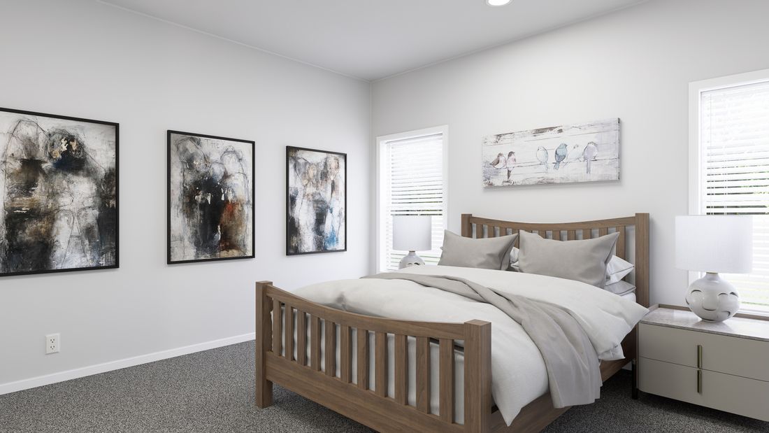 The ING485F BLUE SPRUCE         GW Primary Bedroom. This Manufactured Mobile Home features 2 bedrooms and 2 baths.